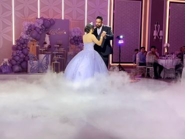 Father and Quinceañera Daughter dancing in the cloud.