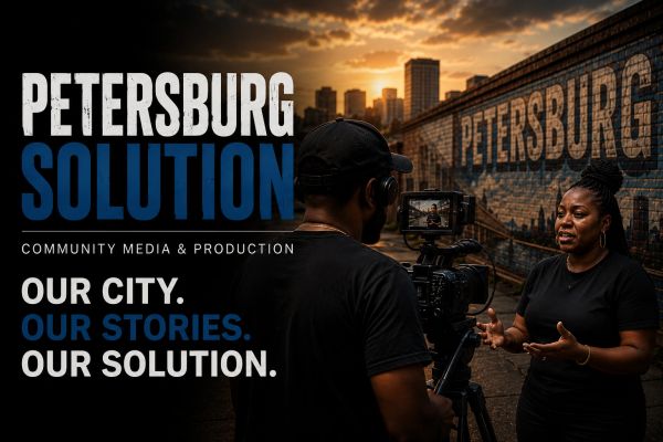 Two people filming a community media piece in Petersburg.