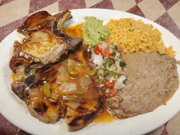Close up image of a plate with full of foods