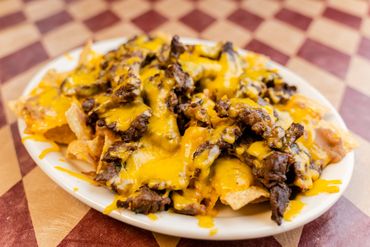 A plate full of food kept on a table