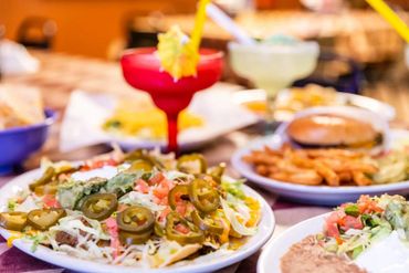 A table full of decorated food and drinks