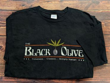 Black short-sleeve t-shirt with the Black Olive logo