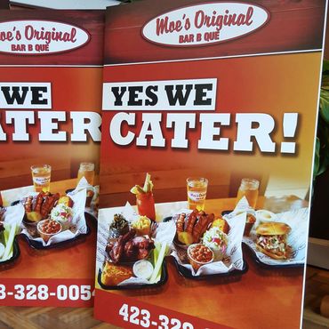 Moe's Original Bar B Que foam board signs