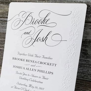 Wedding invitation with embossed side embellishment