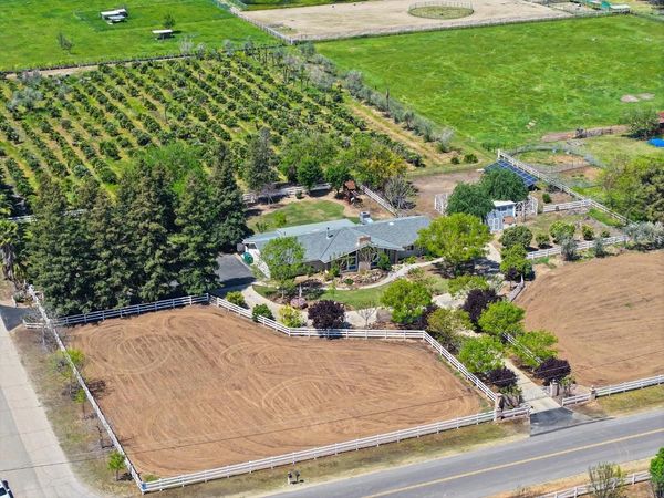Drone shot of a suburban property for sale in Clovis, CA