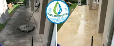 Before and after cleaning a concrete walkway using a surface cleaner.