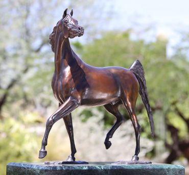 Beautiful bay stallion in bronze.