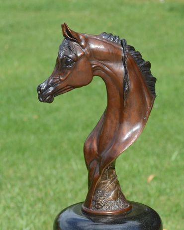 Oasis bronze sculpture in bay bronze patina.