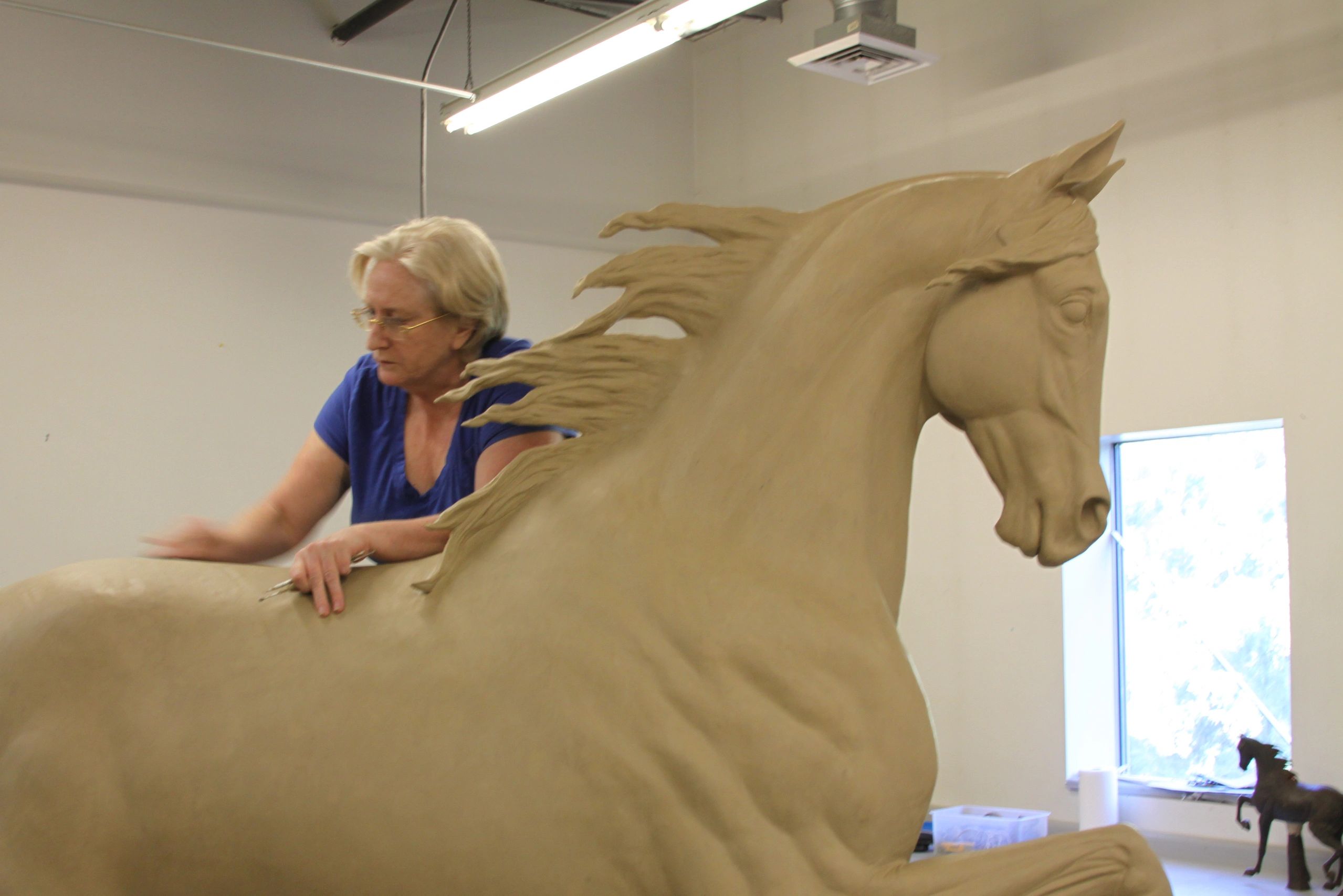 Anne working on a Life size bronze equine commission for US client . 