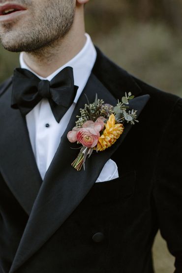 Dahlia and ranunculus boutonniere 