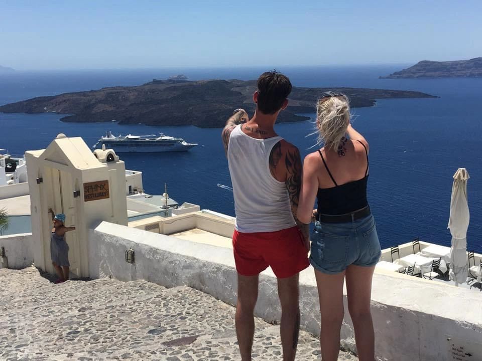 woman and man looking at the ship