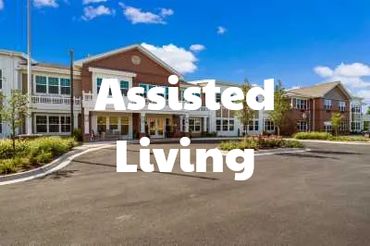 Modern assisted living facility with clear skies and welcoming entrance.