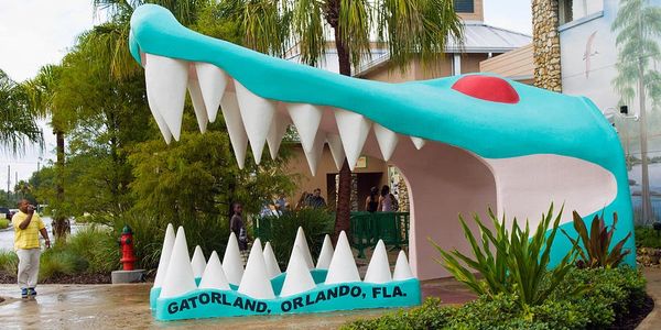 Large colorful alligator mouth entrance at Gatorland in Orlando, Florida.