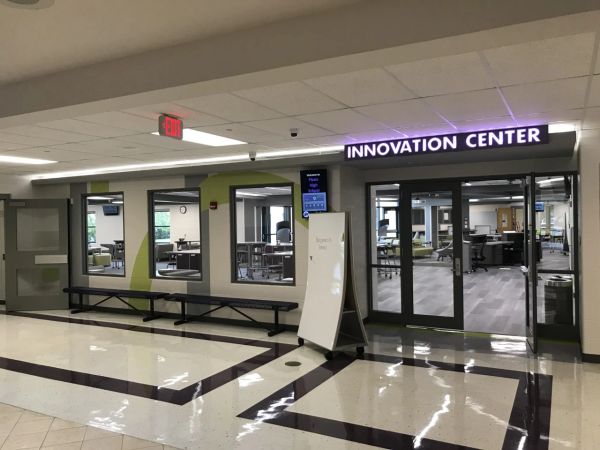 Entrance to a modern Innovation Center in a school.