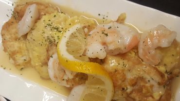 Chicken Francaise topped with Shrimp