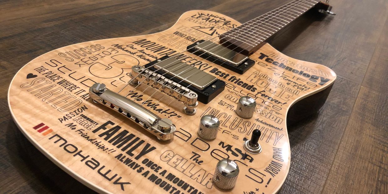 Custom 50th Anniversary guitar for Mohawk College in Hamilton, crafted by Cithara Guitars.