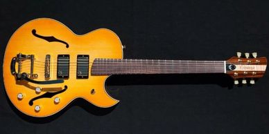 Ty Baynton's custom hollow-body electric guitar with cutaway, made by Cithara Guitars.