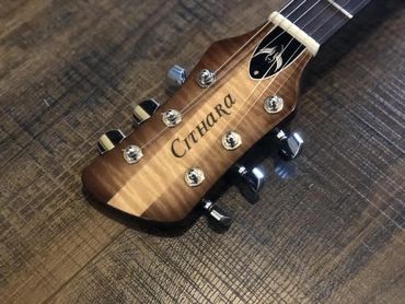 Cithara Guitars headstock photo.