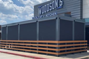 Commercial motorized shades at Woodsons Local Tap