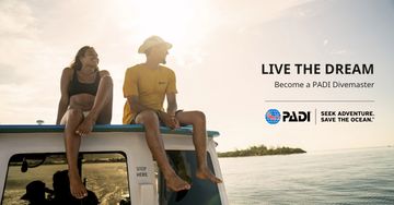 Two people relax on a boat with a PADI Divemaster ad encouraging ocean adventure.