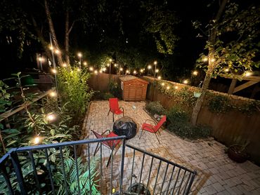 Private backyard perfect for hosting campfires and movie nights