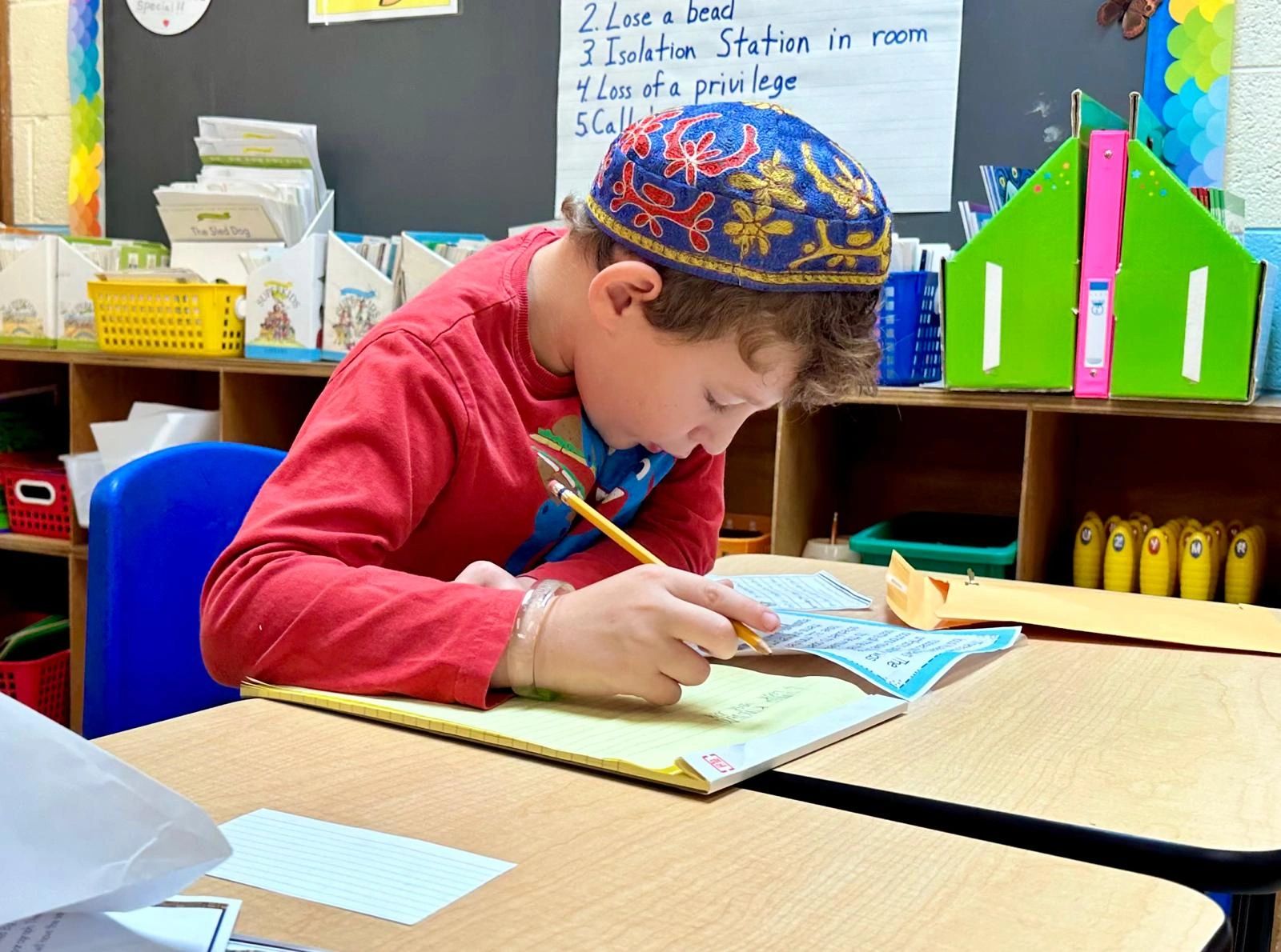 Elementary school boy writing