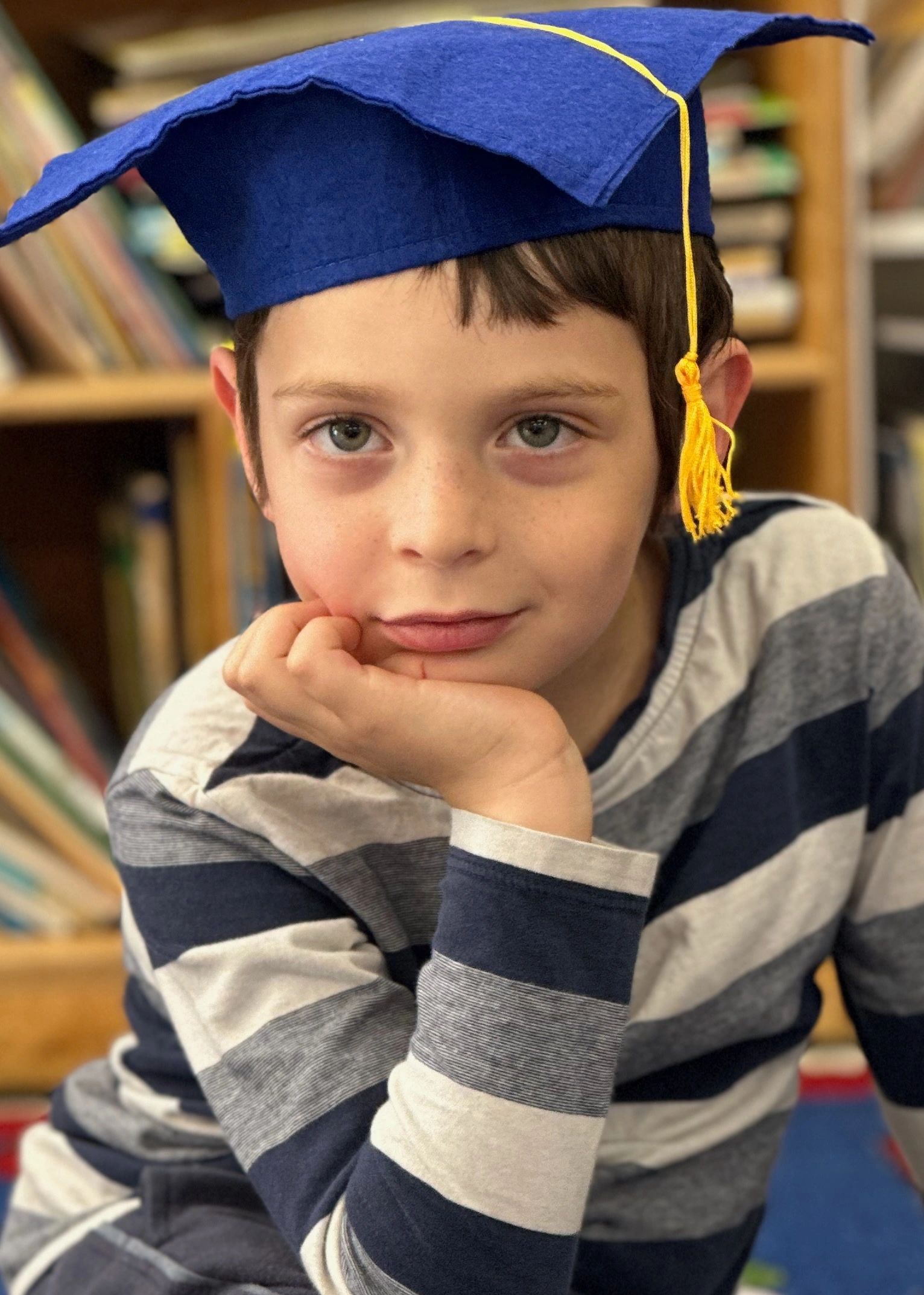 KIndergareten boy in graduation cap