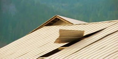 wind damaged metal roof