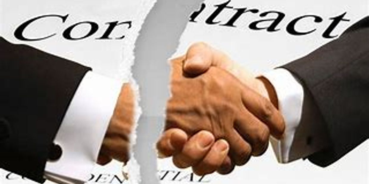 Handshake over torn contract paper.