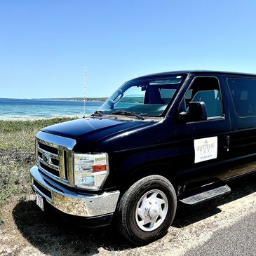 Taxi van on the beach