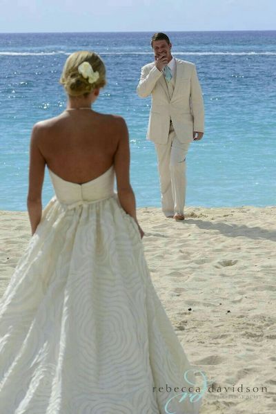 Bride and groom on a beach.