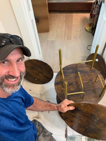 Before - Adam Taylor assembling a bookcase in The Woodlands, TX