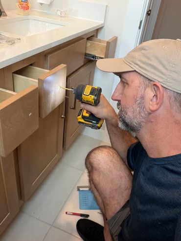 After — Adam Taylor the Handyman cabinet hardware installed in College Park, The Woodlands, TX