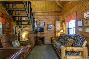 Tucked into a mature bamboo forest and only 20' off of Cobb Creek. It is a true dovetail log cabin v