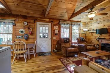 The Bear Cabin is a true log cabin that sits directly on Cobb Creek.