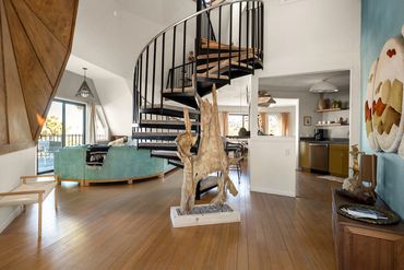 architectural, unique, quaint, cozy, interesting, eye catching, color pop, spiral stairs