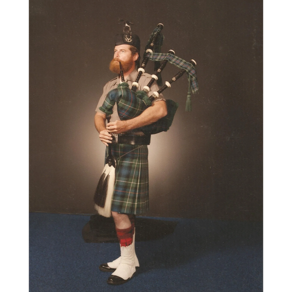 Iowa Bagpiper Ron Husted as a young piper.