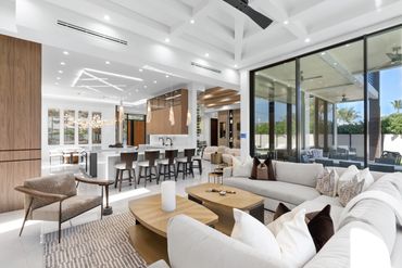 family room. sectional sofa. double coffee tables. open floor plan