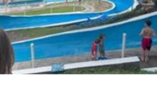 Huge waterslide that young and old love to ride over and over