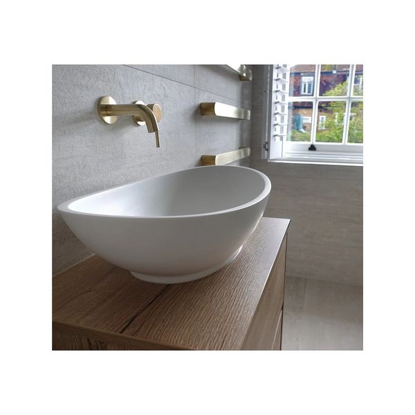 Bathroom basin, heated towel rail and window