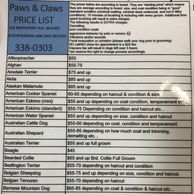 Price list for dog grooming services at Paws & Claws.