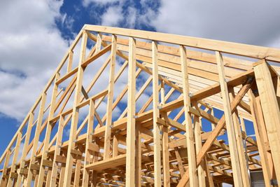 Wooden framework of a house under construction.