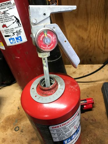 Gauge reads full but extinguisher is empty. This is why 6-year maintenance break downs are important