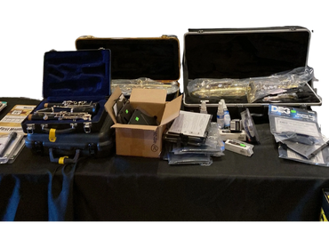Band Instruments and Accessories on a Table at Music Matters