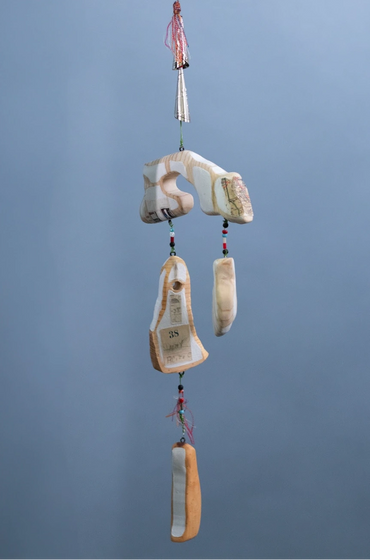 Detail of "Trail Shawl".
Wood, wire, beads, jingles, paint.
Purchased by Great Plains Art Museum fo