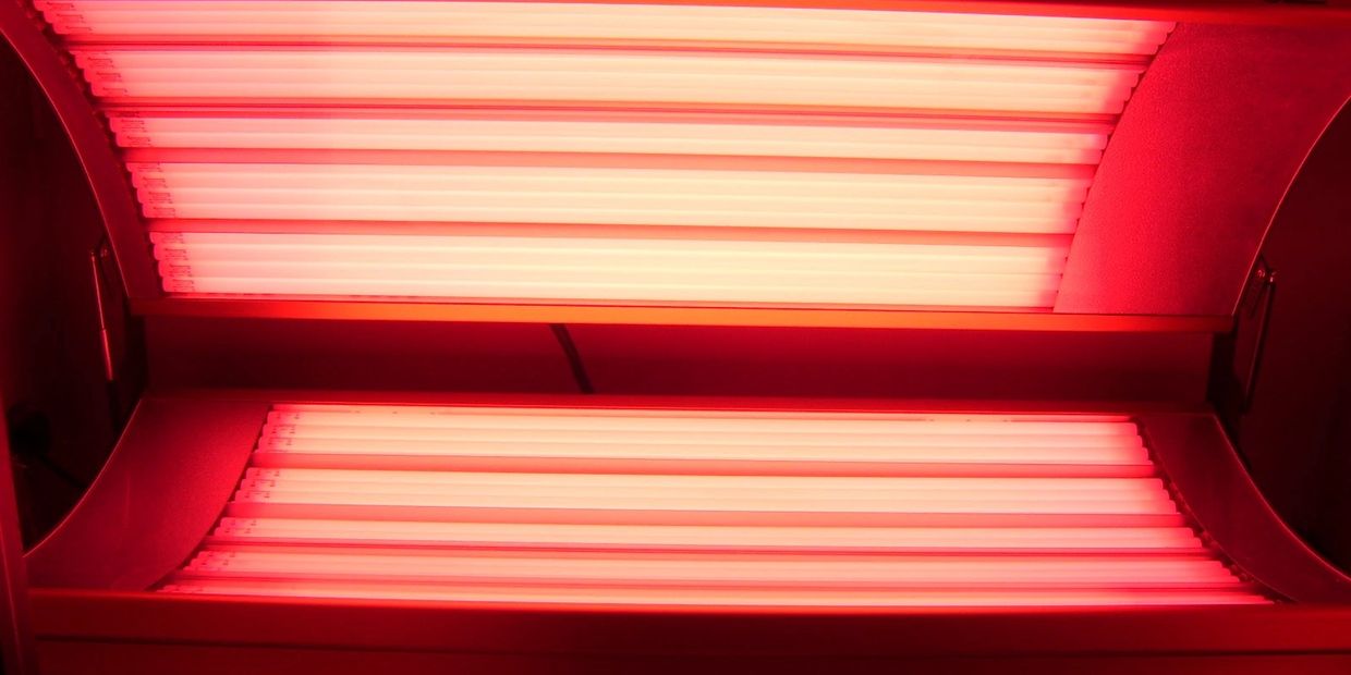 The red light therapy bed shown is a 30 + bulb full body  bed that smothers the body in red light