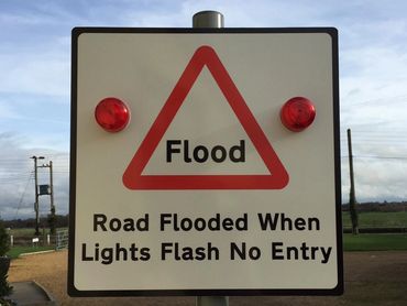 Automated Flashing Flood Signs