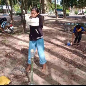 Cambodia Baseball innovative creation of a T for baseball practice in Cambodia
