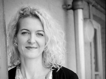 Stylish confident female  looking at camera