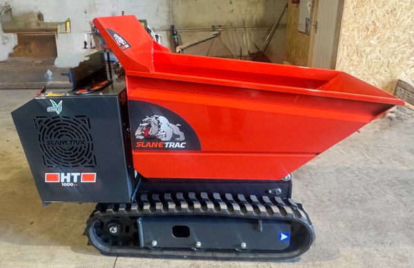 Red mini dumper with black tracks.